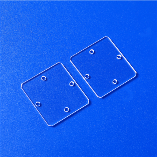 Slotted and drilled quartz glass plate Slotted and drilled quartz glass plate